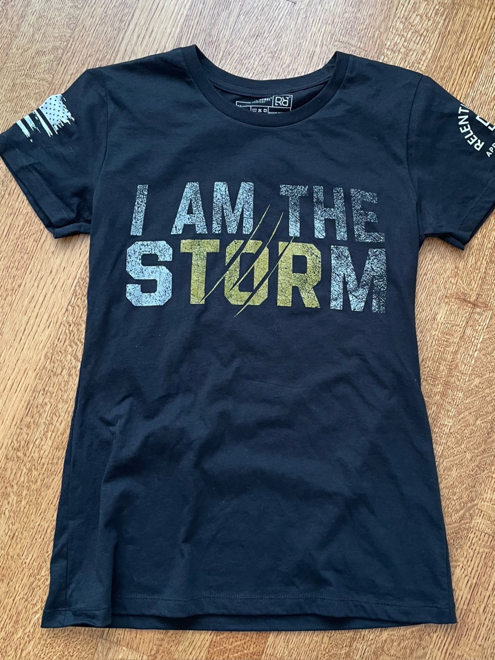 Relentless Rebel Women’s Medium T-Shirt Black “I am the Storm” Flag Edgy Empower